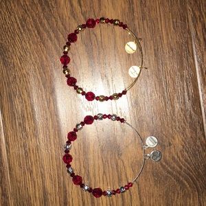 One gold & one silver Alex & Ani red bracelets